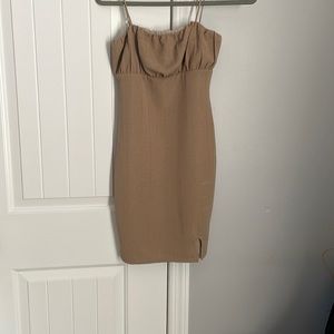 Tan bodycon dress.